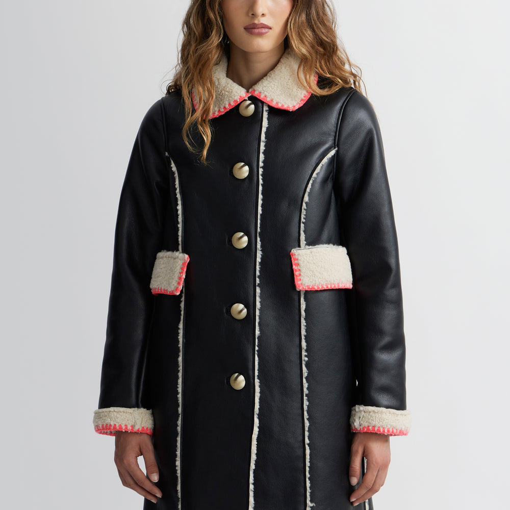 
                      
                        Mouton Coat
                      
                    