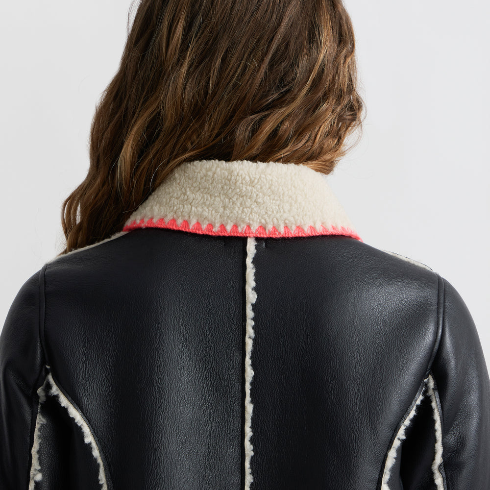 
                      
                        Mouton Coat
                      
                    